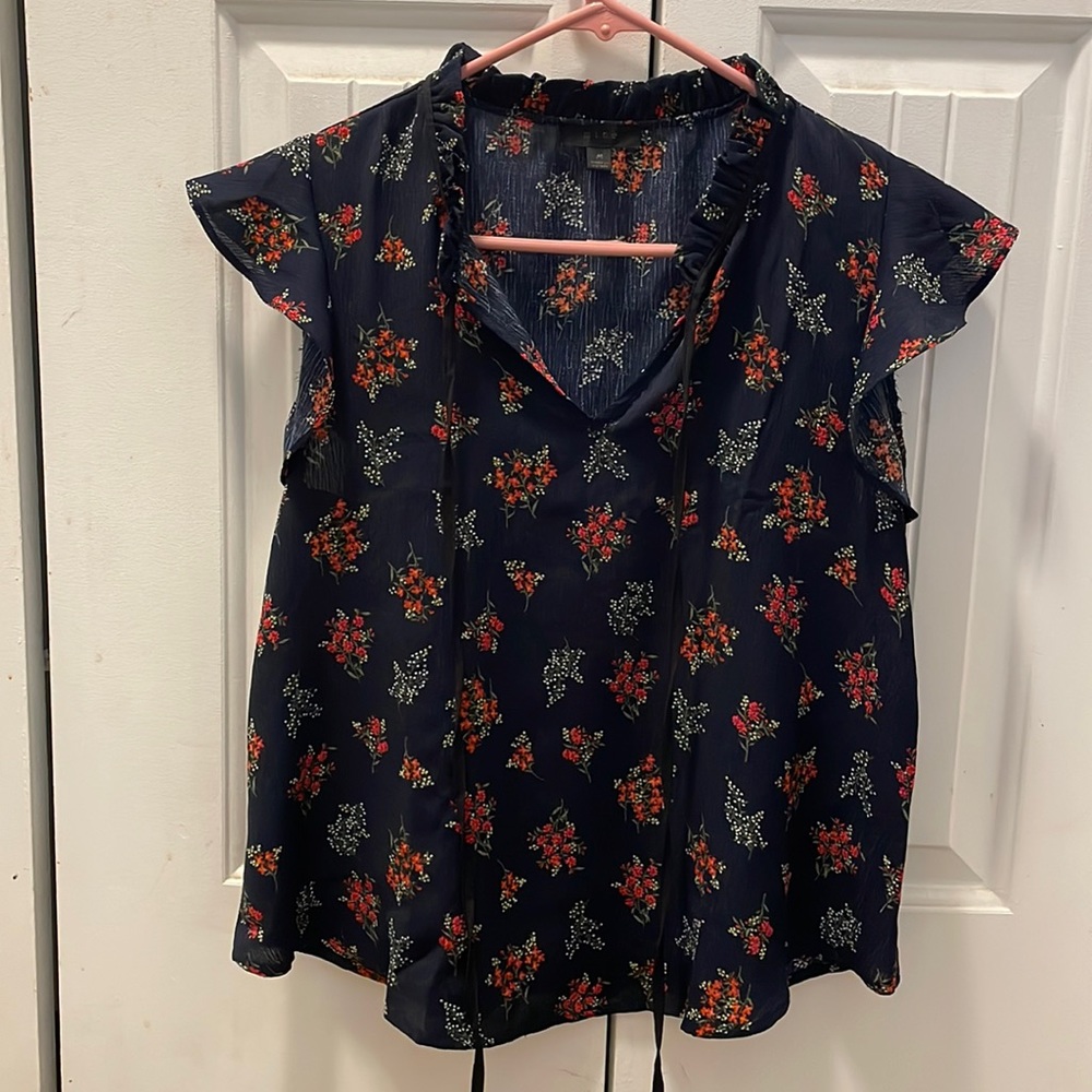 Mine navy blue blouse with red/white flowers size medium